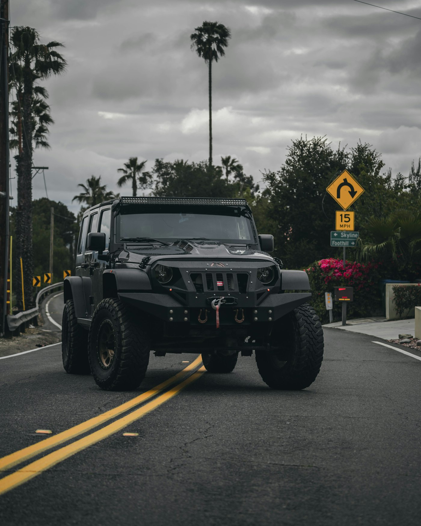 Lifted Jeep Wrangler with winch and armor